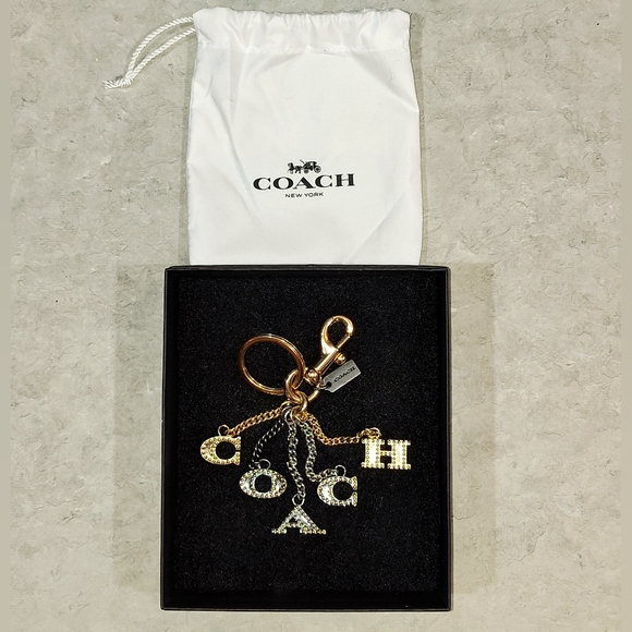 NWOT Coach Perforated Sparkle "COACH" Letters Gun Metal Bag Charm Keychain - Picture 3 of 7